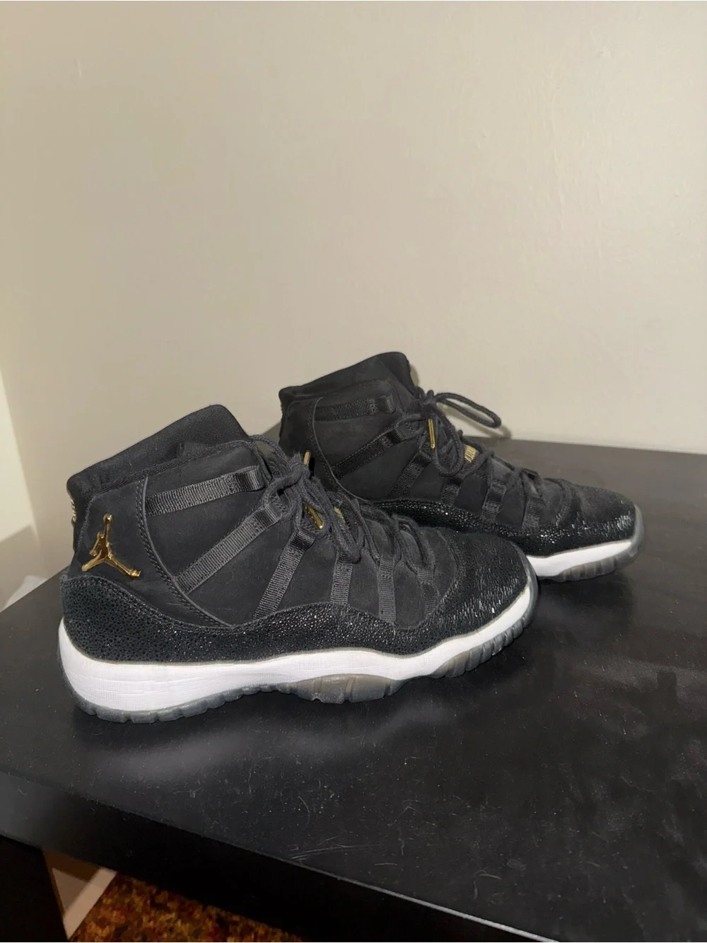 Jordan Black and Gold High-Top Sneakers